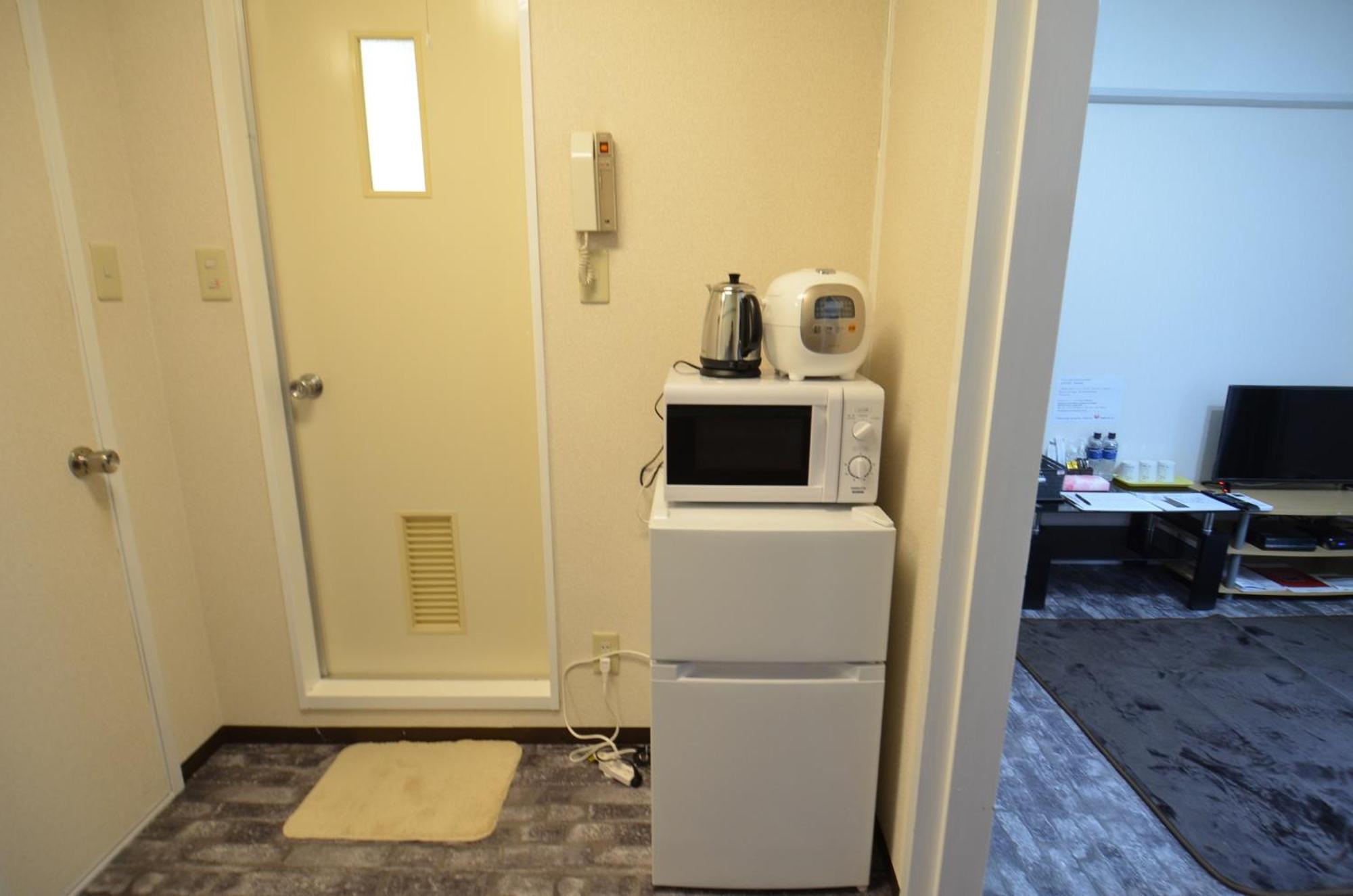 Comfort Cube Phoenix Miyazaki Apartment Room photo